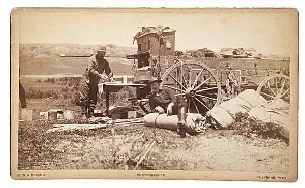 Appraisal: C D Kirkland Photograph of Wyoming Cowboys and their Chuckwagon