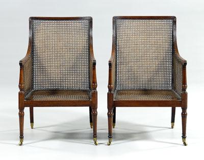 Appraisal: Pair Regency caned library chairs each mahogany with reeded crest