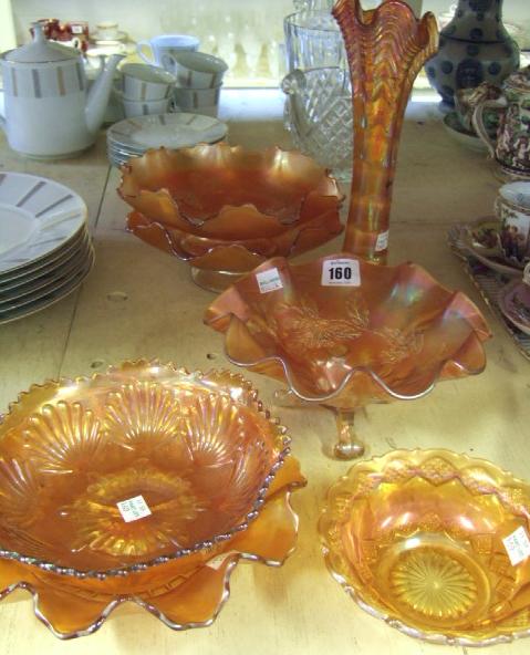 Appraisal: Six orange carnival glass bowls and an orange carnival glass