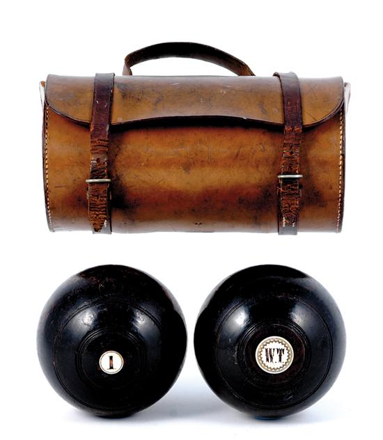 Appraisal: Lawn bowls set in leather carrying case L both balls