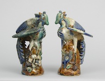 Appraisal: A Pair Of th Century Chinese Stoneware Phoenix Figurines A