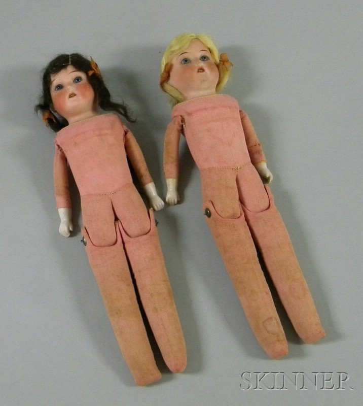 Appraisal: Pair of Heubach-Koppelsdorf Bisque Shoulder Head Dolls with straw-filled cloth