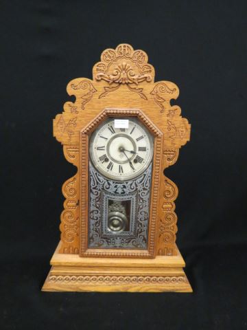 Appraisal: Ansonia Gingerbread Clock day movement hour hour strike oak case