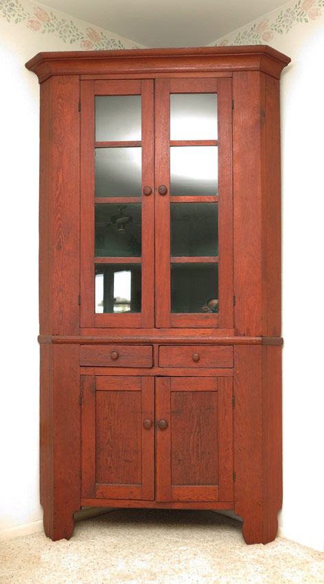 Appraisal: AMERICAN COUNTRY PINE CORNER CUPBOARD panel glass top doors with