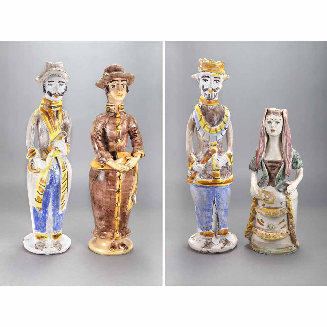 Appraisal: Group of Four Italian Faience Figural Candlesticks Arpino or Contaginori