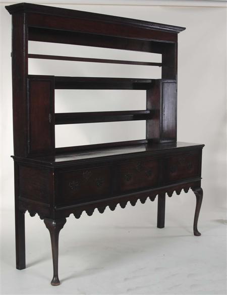 Appraisal: An th century oak dresser the projected moulded cornice over