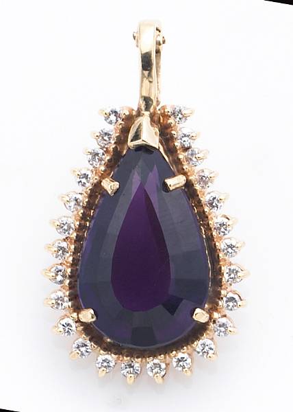 Appraisal: An amethyst and diamond pendant-enhancer mounted in fourteen karat gold