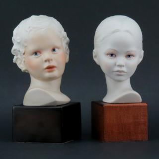 Appraisal: Two Cybis Polychrome Porcelain Young Male and Female Busts Mounted