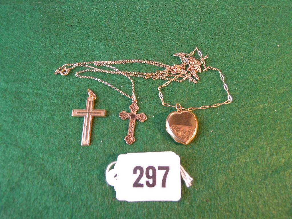 Appraisal: Two ct yellow gold Latin crosses each with decoration to