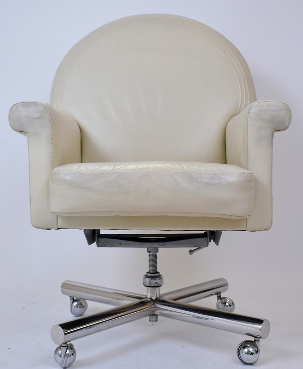 Appraisal: MODERN WHITE LEATHER AND CHROME ARMCHAIRArched back padded arms and