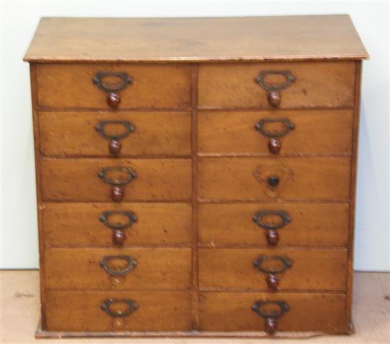 Appraisal: Late Victorian Collectors mahogany chest of twelve drawers with turned