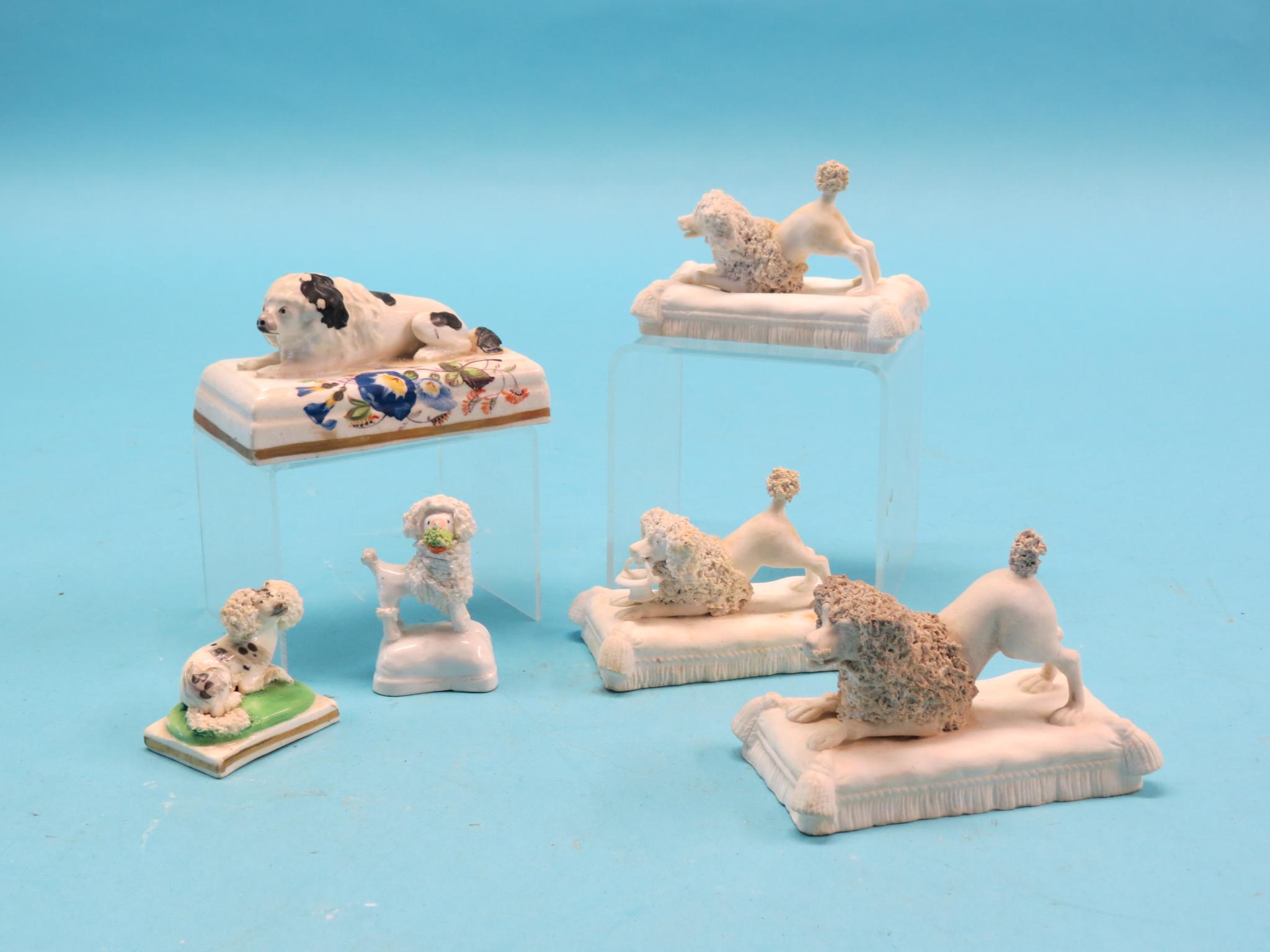 Appraisal: Victorian ceramic dog models including group of three bisque models