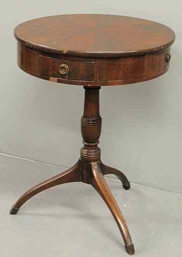 Appraisal: Regency style mahogany end table with round top four small