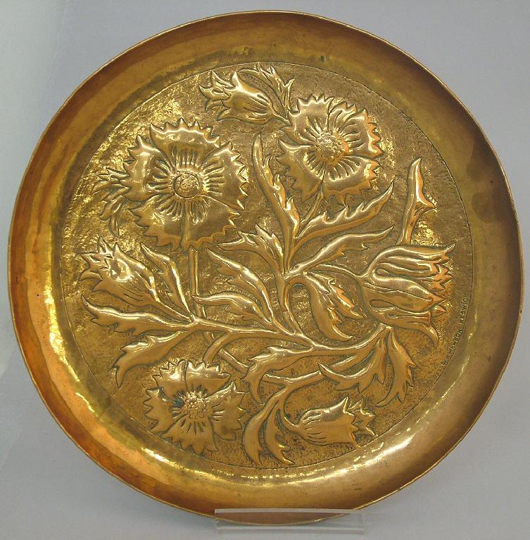 Appraisal: W H Mawson Keswick circular copper dish embossed with flowers