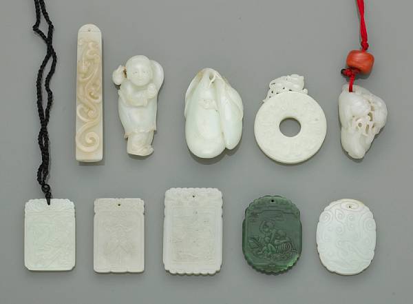 Appraisal: A group of nine jade carvings Including a feather holder