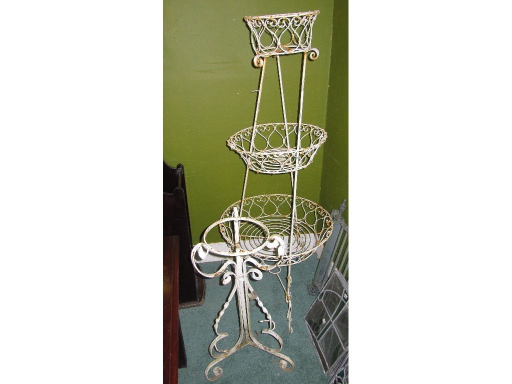 Appraisal: Victorian wrought iron garden plant stand jardinere stand and a