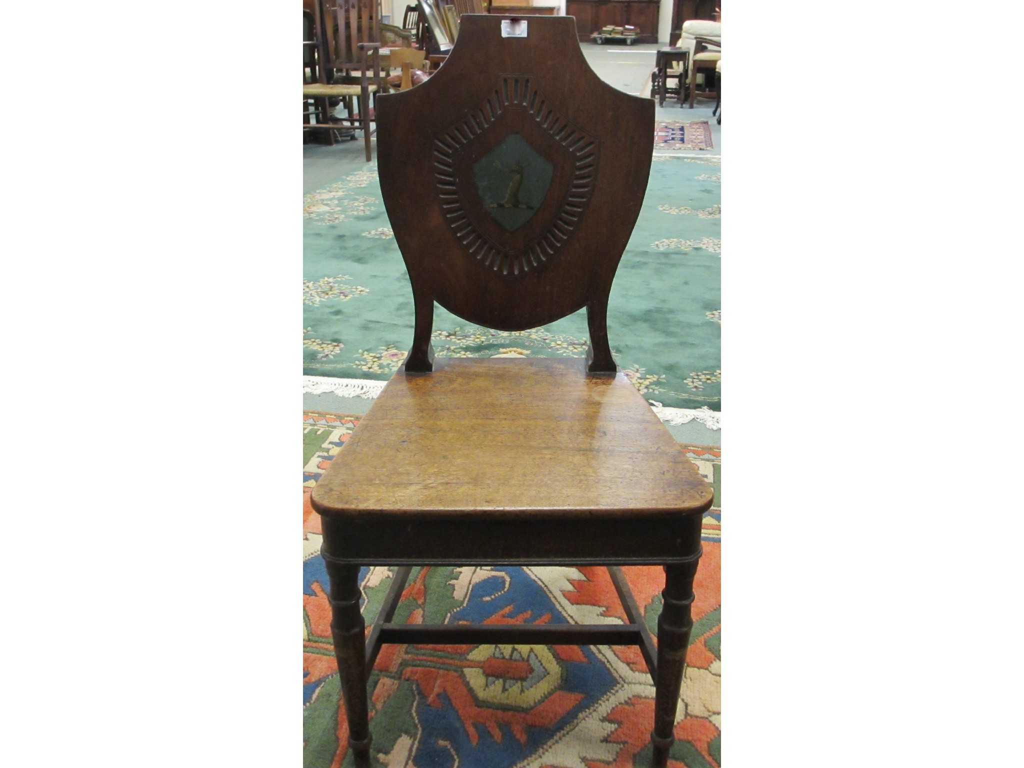 Appraisal: Georgian mahogany armorial hall chair