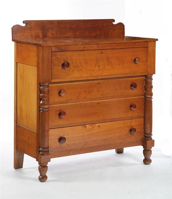 Appraisal: EMPIRE STYLE CHEST Walnut four drawer chest with a shaped