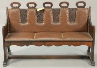 Appraisal: Carved bench with leather upholstery ht in wd in Carved