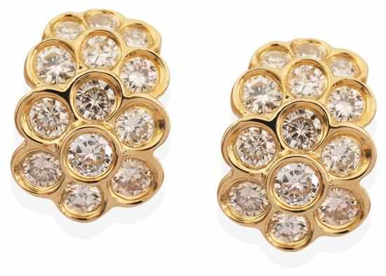 Appraisal: A PAIR OF DIAMOND EARRINGS Each earring comprising a double