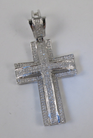 Appraisal: DIAMOND CROSS PENDANT k white gold and covered with pave'