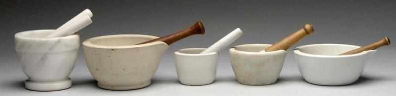 Appraisal: Lot of Ceramic Marble Mortars Pestles Description Circa to Three