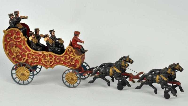 Appraisal: Cast Iron Hubley Horse-Drawn Band Wagon Toy American Smaller version