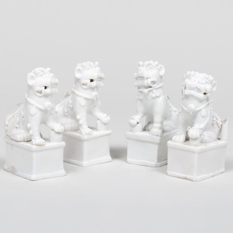 Appraisal: Group of Four Chinese Export White Glazed Porcelain Buddhistic Lion