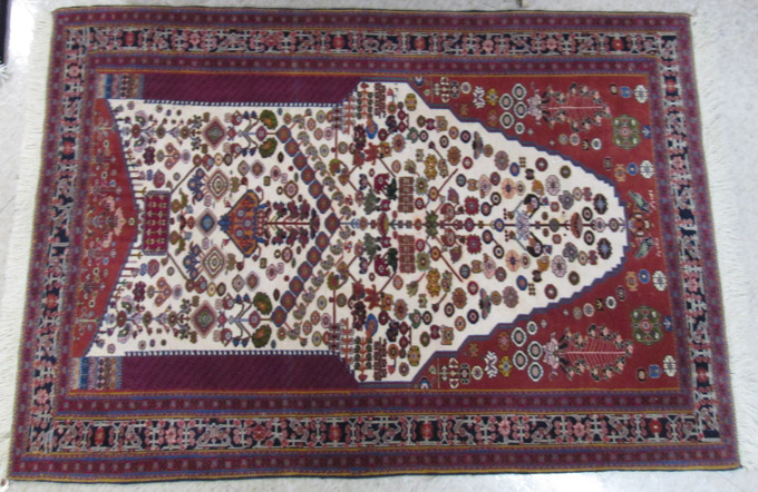 Appraisal: PERSIAN PRAYER RUG featuring a flower-filled ivory prayer mihrab RAJ