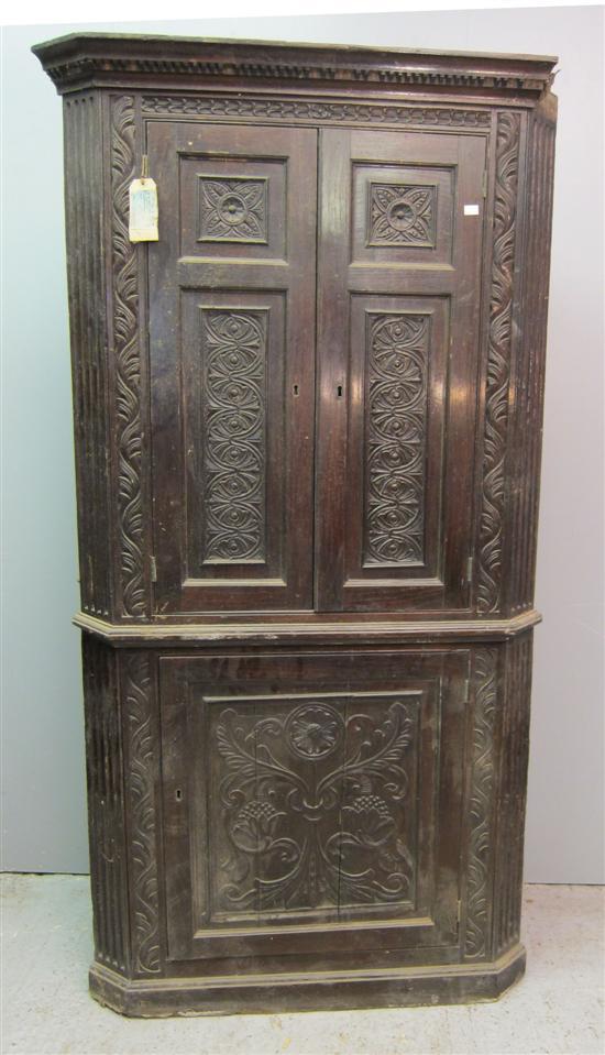 Appraisal: th century oak corner cupboard the top with two cupboard