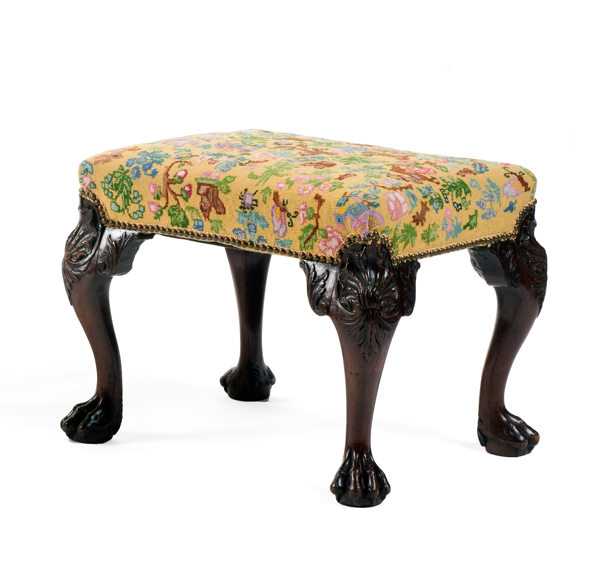 Appraisal: ENGLISH CHIPPENDALE CARVED MAHOGANY FOOTSTOOL The over-upholstered rectangular seat raised