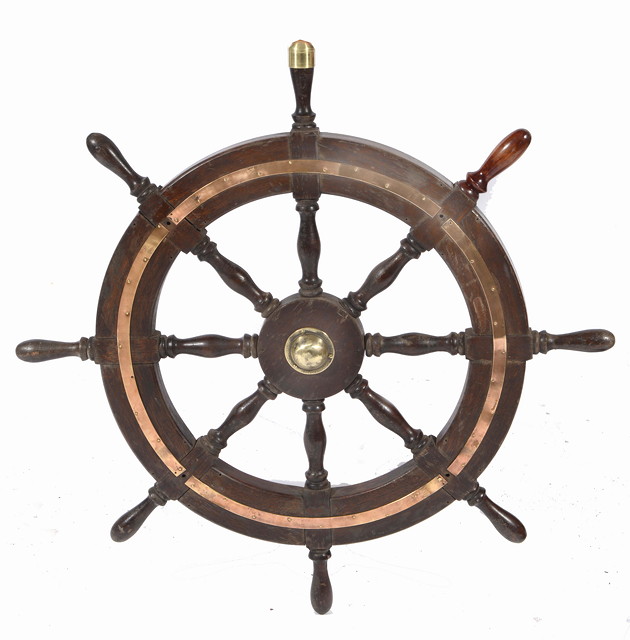 Appraisal: AN OLD TEAK SHIPS WHEEL diameter