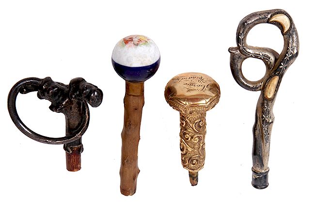 Appraisal: CANE WALKING-STICK UMBRELLA HANDLES CANE WALKING-STICK UMBRELLA HANDLES FOUR VINTAGE