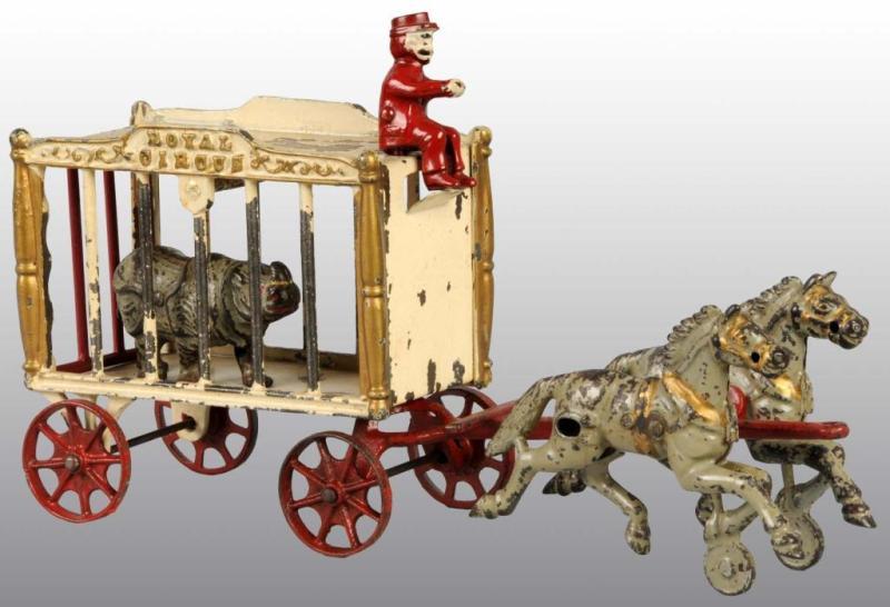 Appraisal: Cast Iron -Horse Royal Circus Cage Wagon Toy Description All