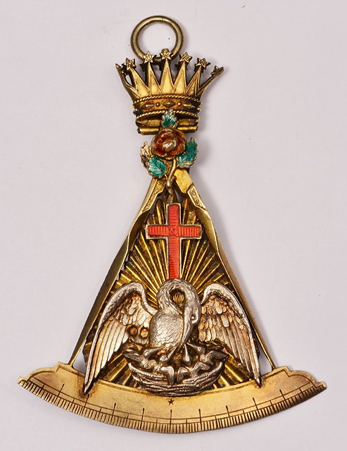 Appraisal: A VICTORIAN SILVER GILT MASONIC PENDANT showing relief applied birds