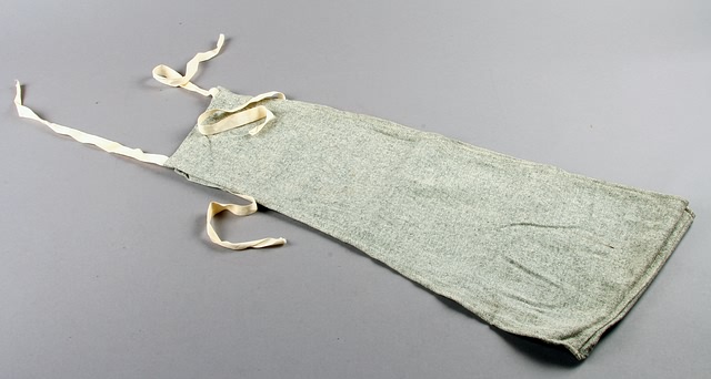 Appraisal: Gray Flannel Malaria Band Gray Flannel Belly Belt issued to