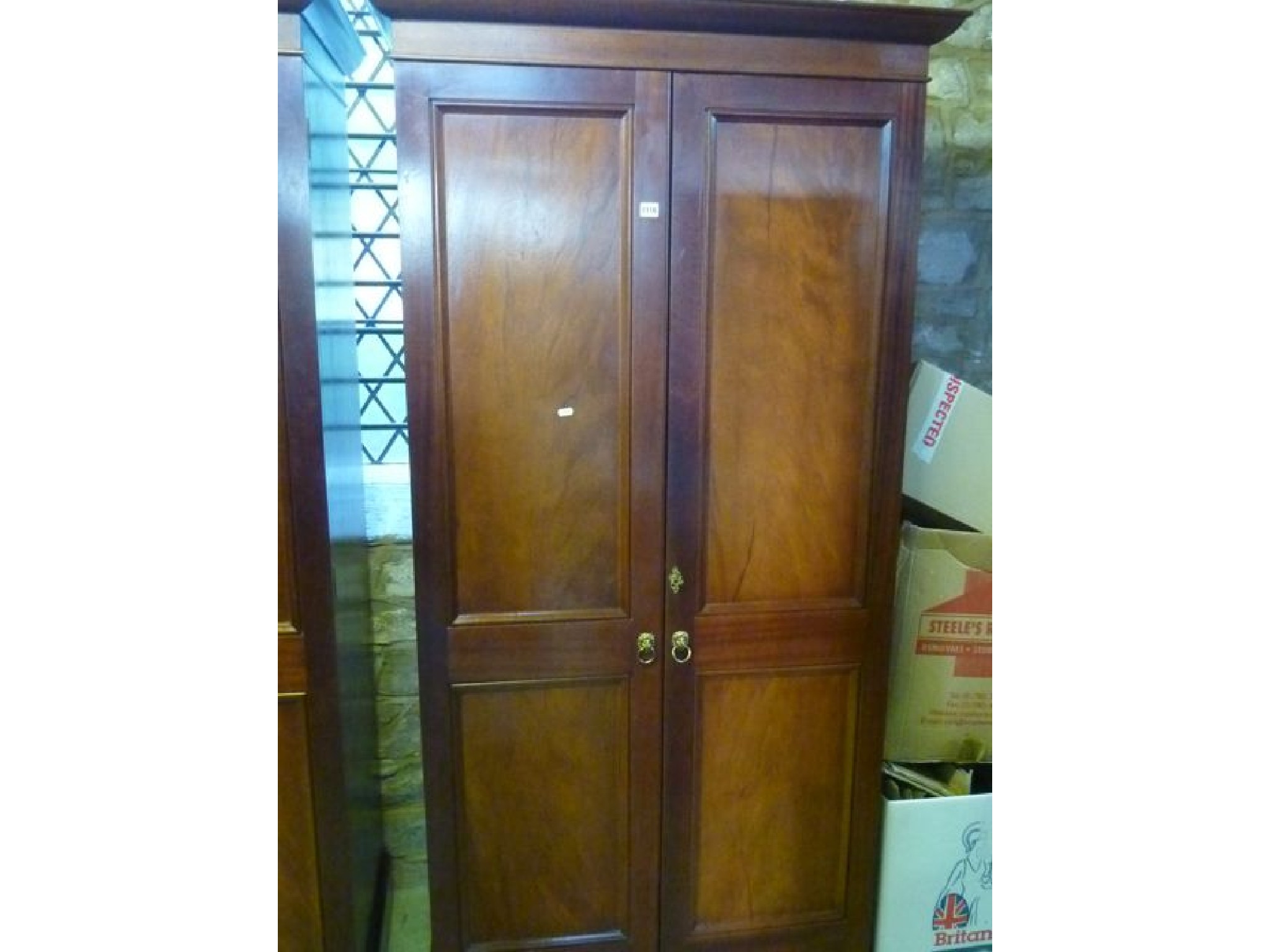 Appraisal: A good quality contemporary mahogany wardrobe in the Georgian style