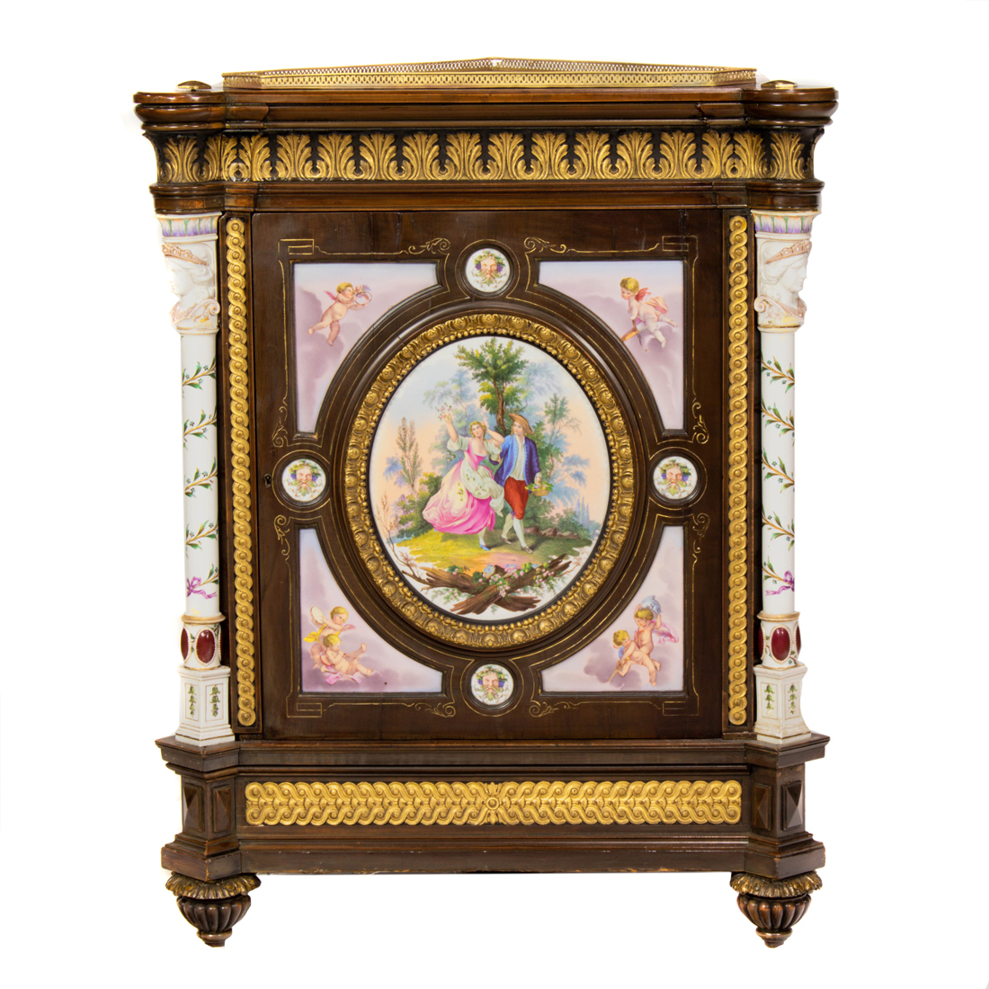 Appraisal: A Continental Neoclassical style porcelain mounted corner cabinet the top