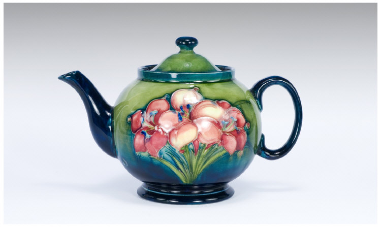 Appraisal: Moorcroft Pottery Freesia Pattern Teapot Circular Teapot Decorated With Freesias