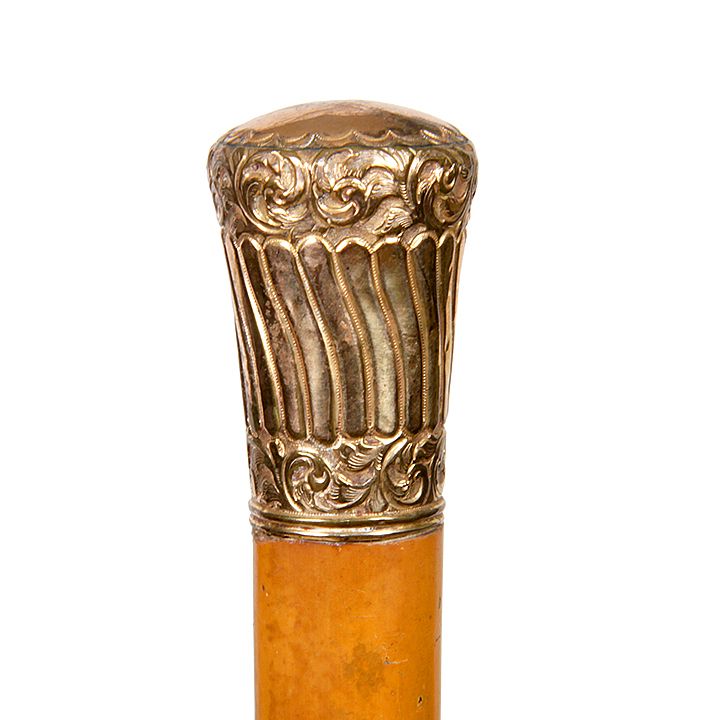 Appraisal: Gold Dress Cane Ca - Gold-filled handle with various designs