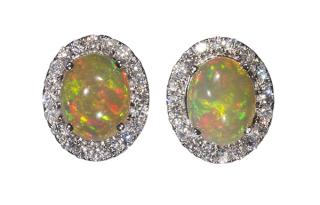 Appraisal: Pair of fire opal diamond and k white gold earrings