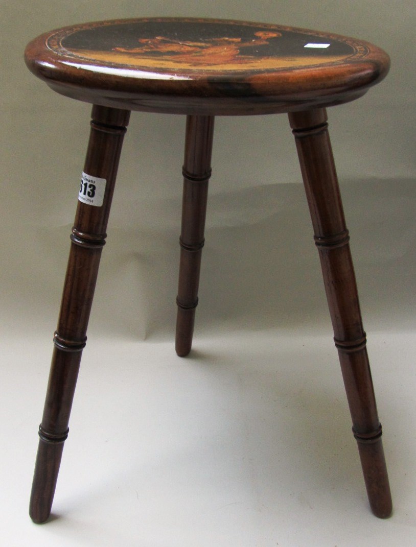 Appraisal: A th century walnut framed three legged circular occasional table