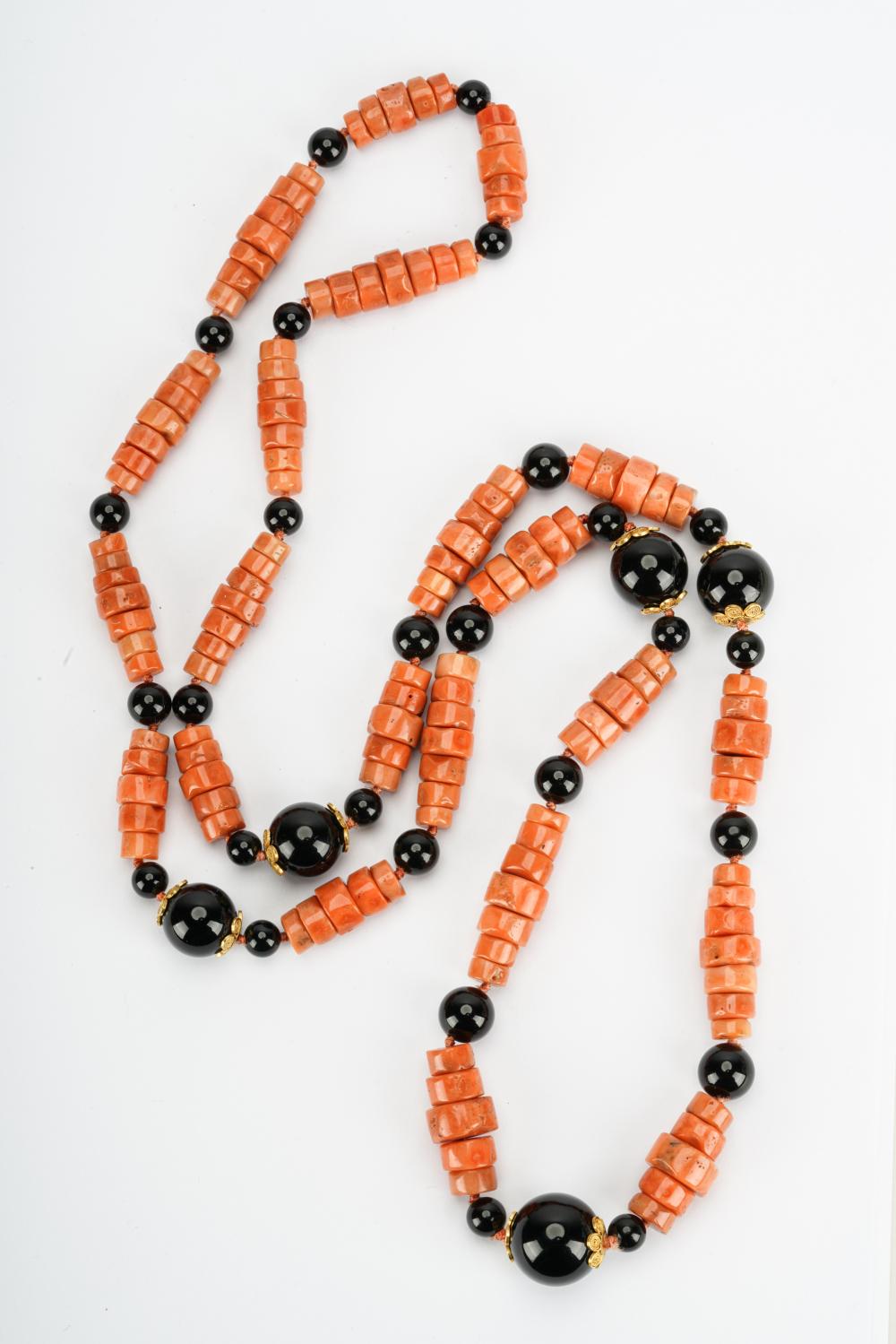 Appraisal: BARBARA RICKLES KARAT YELLOW GOLD CORAL ONYX NECKLACEcontaining round drilled