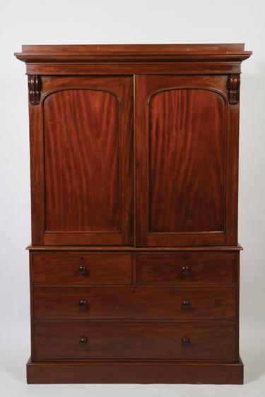 Appraisal: A VICTORIAN MAHOGANY LINEN PRESS with a moulded cornice above