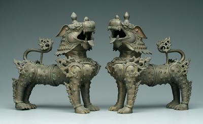 Appraisal: Pair Thai bronze lions male and female three-piece construction th