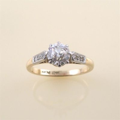 Appraisal: A diamond solitaire ring the old circular cut diamond is