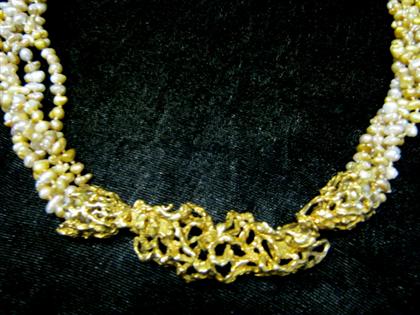 Appraisal: karat yellow gold and pearl necklaceFive strands of cultured pearls