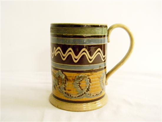 Appraisal: th century mochaware mug '' high with polychrome decoration large