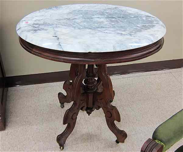 Appraisal: VICTORIAN LAMP TABLE American c having an oval gray white