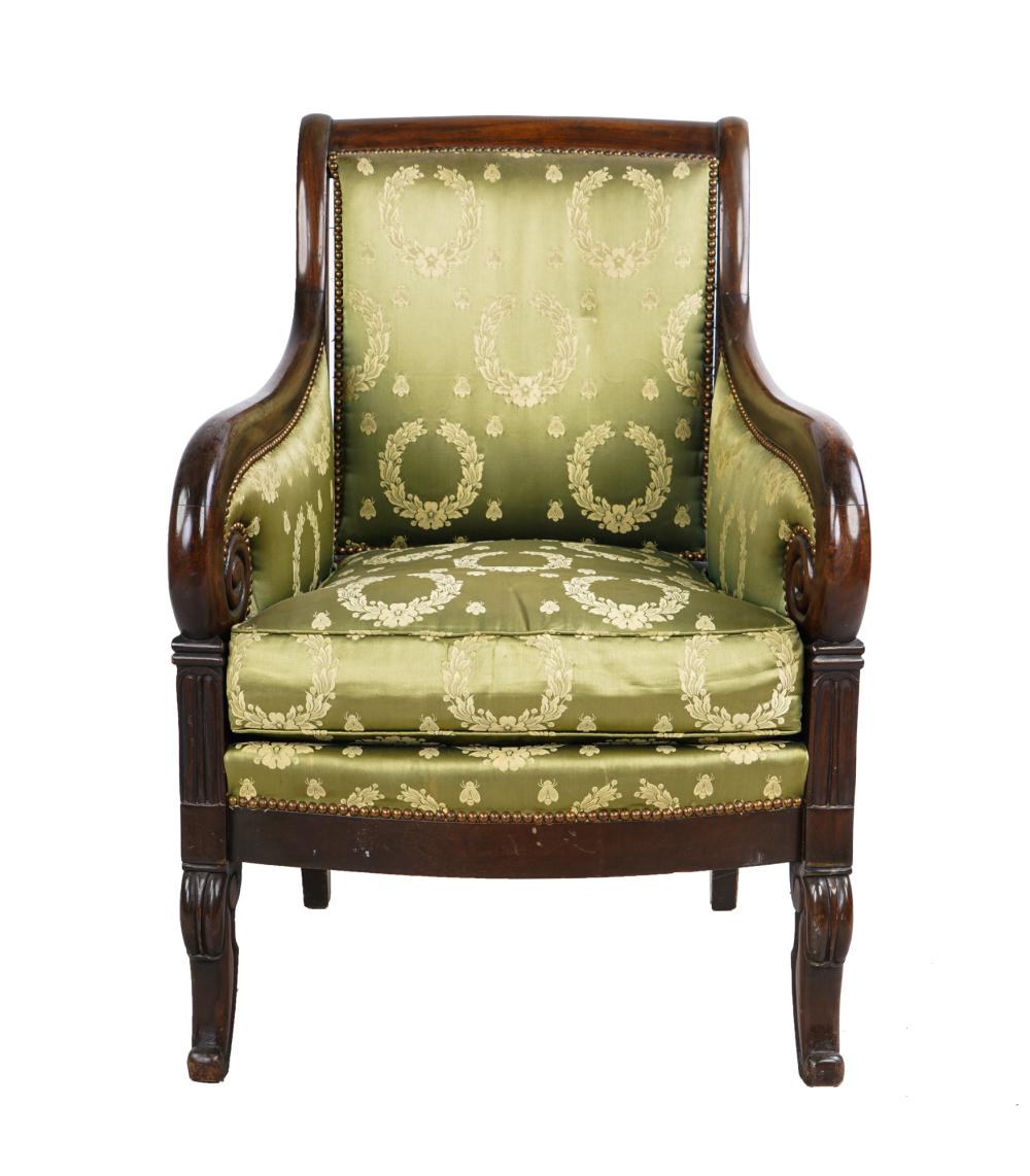 Appraisal: FRENCH WALNUT ARMCHAIRwith studded upholstery and scrolled arms Condition slight